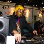 NYCC 09: Scenes from the Convention Floor: Masked Man Spinnin' Some Tunes for the Attendees